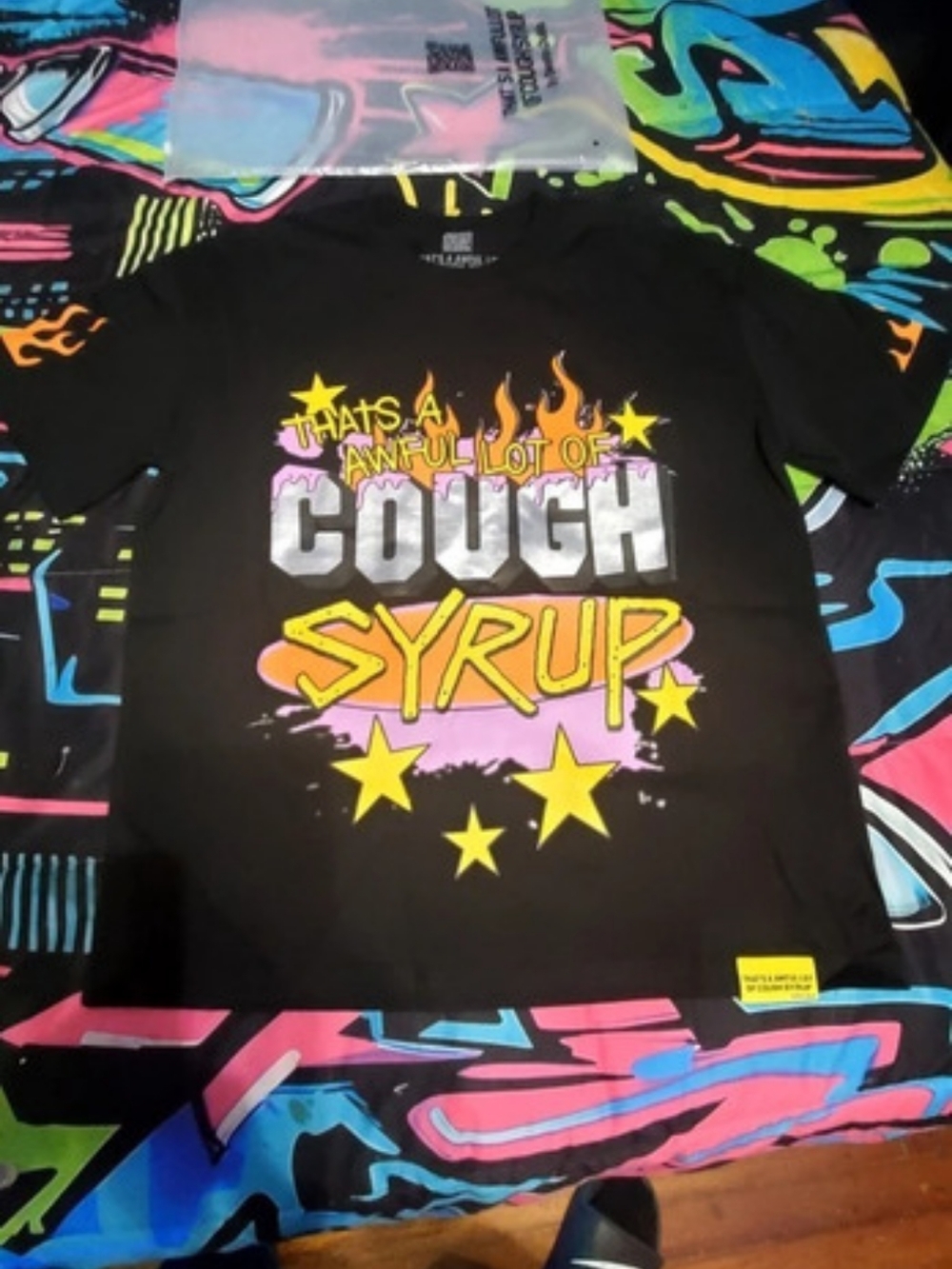 "That's A Awful Lot Of Cough Syrup"Graphic Short Sleeve Tee in Black & Orange